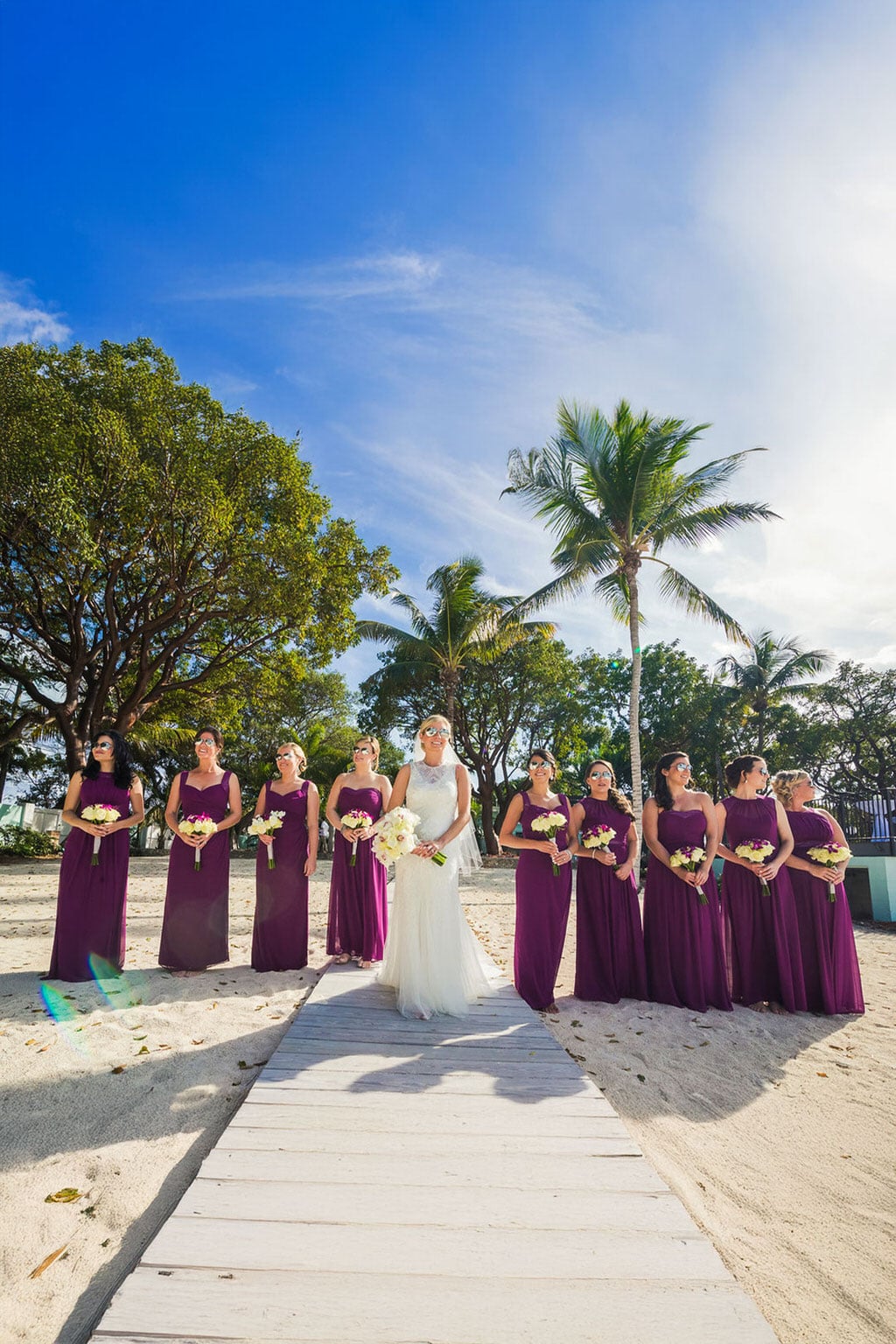 Wedding party with destination beach backdrop